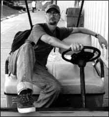 Jesse Day on golf cart