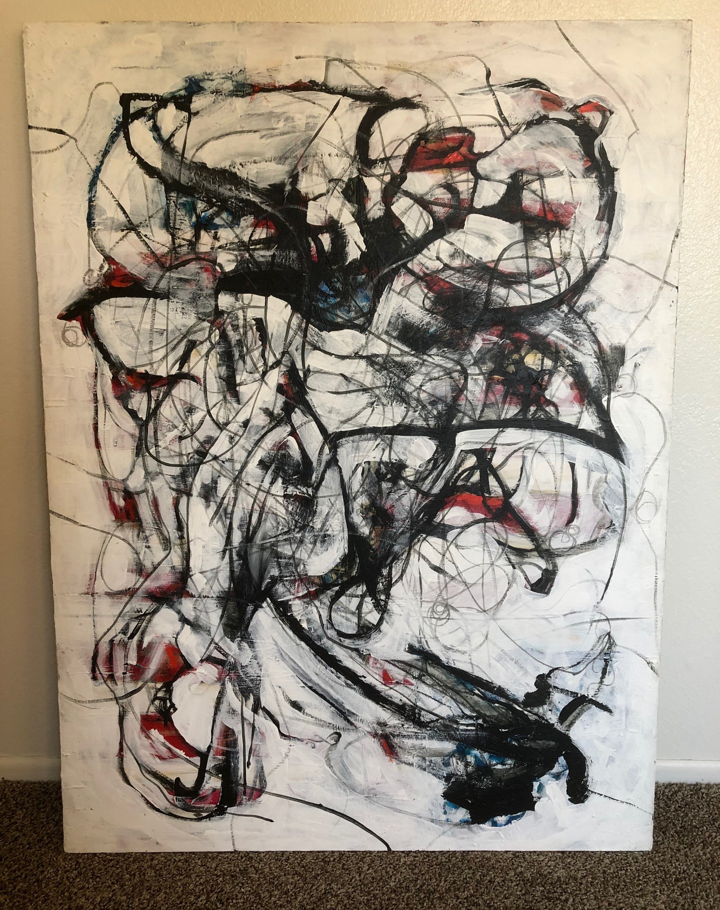 Black and white and red abstract painting