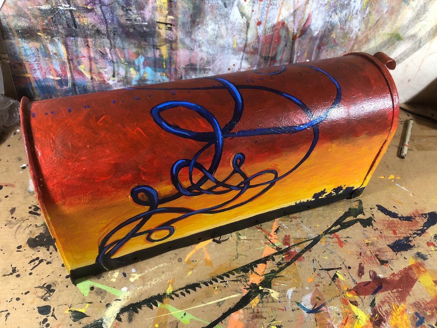 Completed acrylic painting of a sunset behind some wild wirey shit on a mailbox
