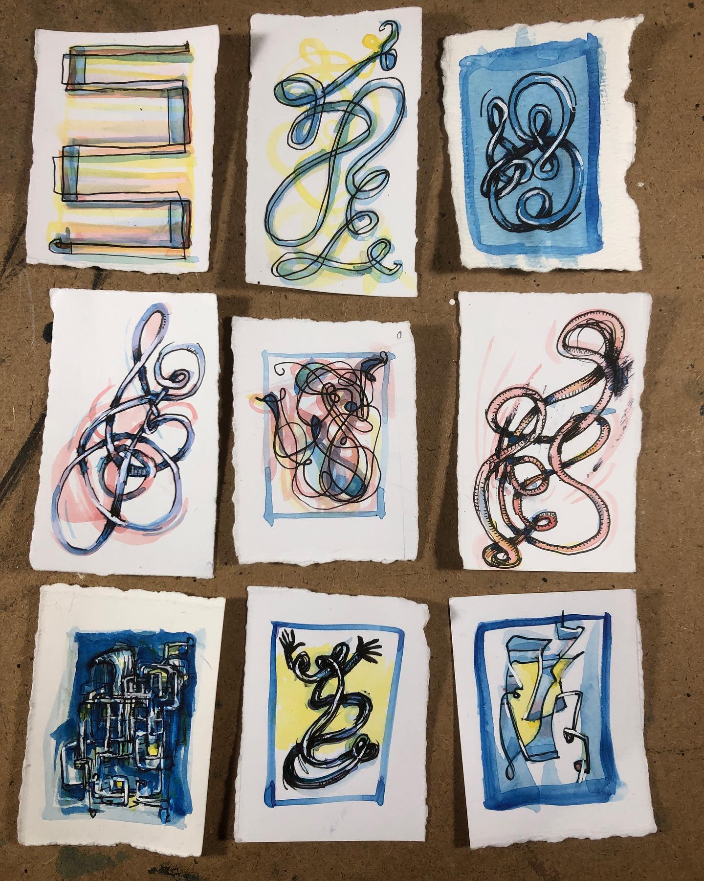 Nine watercolor/ink drawings of squiggley noodle forms