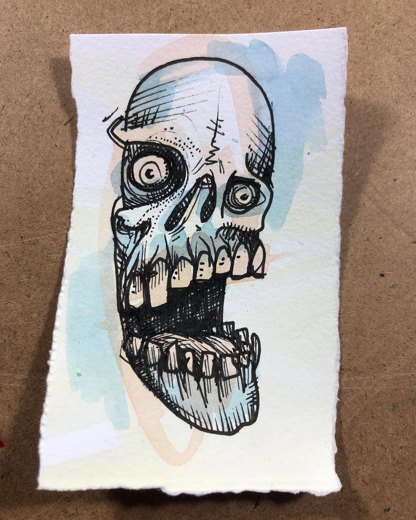 Chompy-chompy! Ink and watercolor drawing of a chomping skull face with big ole teeth