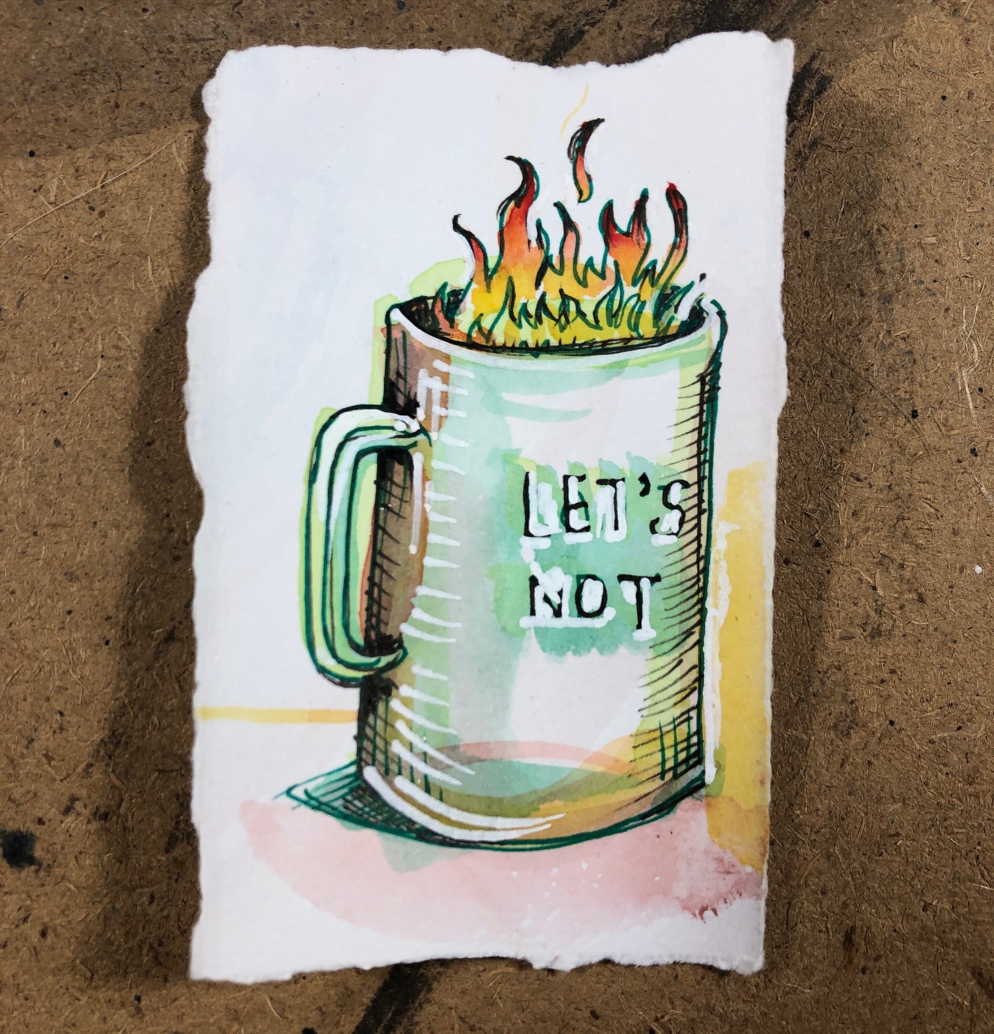 Coffee mug with fire coming out the top. The mug contains the inscription: "Let's Not".