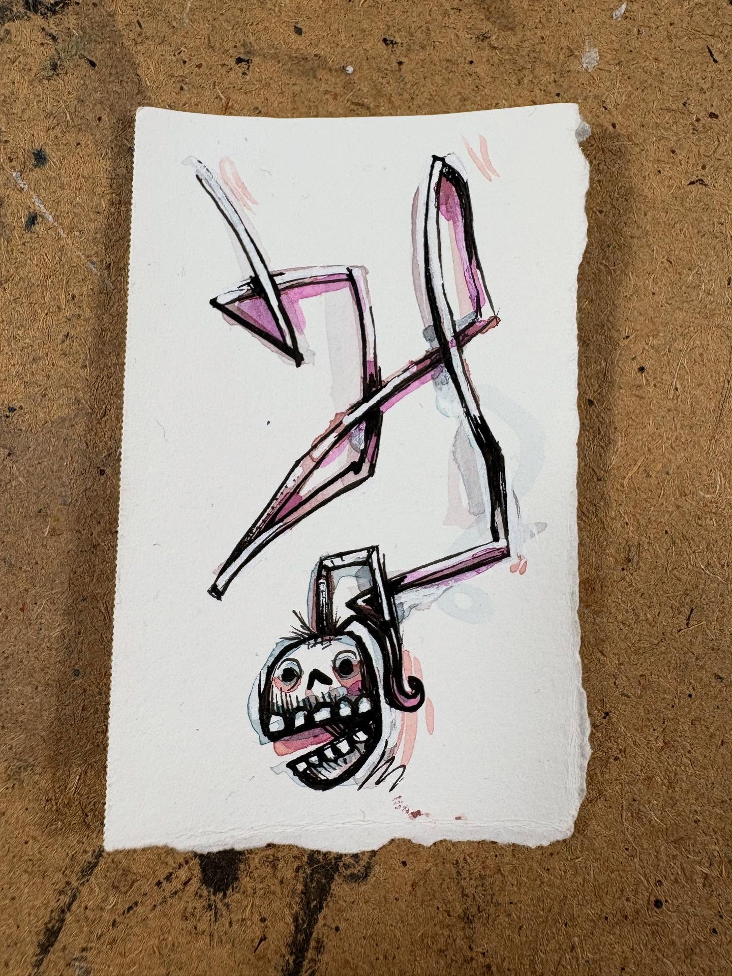 Do Ya Head Like This - ink and watercolor drawing of a skull-head with a single rhythmic ribbon shooting out the top of it